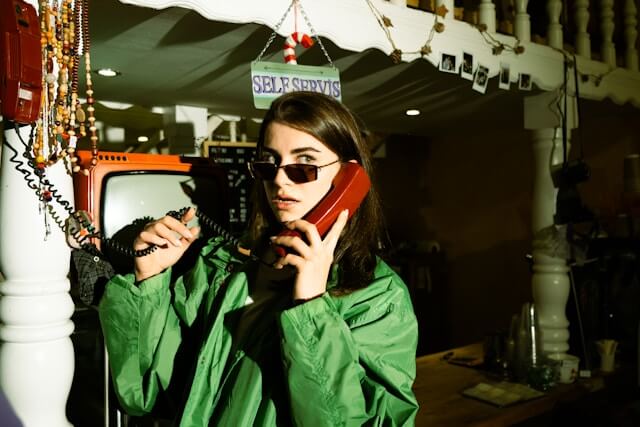 Woman on red phone