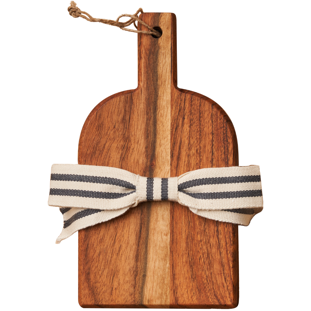 Wooden cutting board with a striped cloth tied around it on a white background