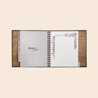 Open recipe book with 'desserts & drinks' section on a beige background