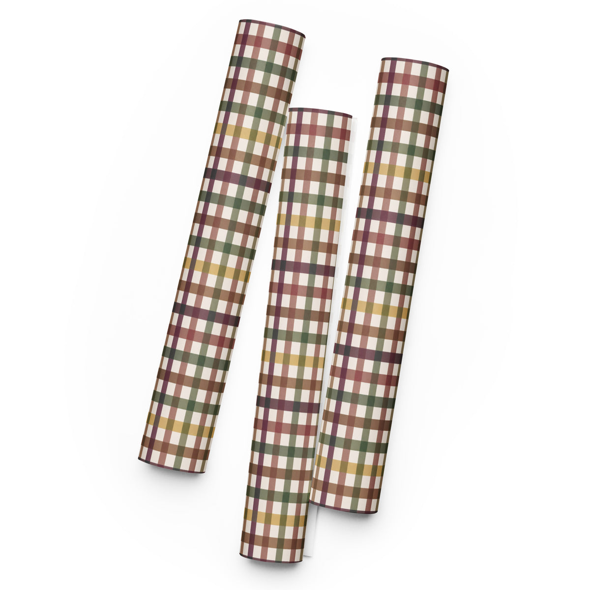 Three sheets of plaid wrapping paper rolled and standing upright on a white background. The wrapping paper features a multi-colored plaid pattern with intersecting stripes of brown, green, yellow, and white.