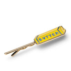 Butter bar-shaped tie clip with gold finish on a white background