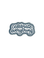Embroidered patch with 'Celebrate Everything' text on a white background