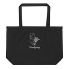 Black tote bag with 'Frenchgiving' text in white on black background