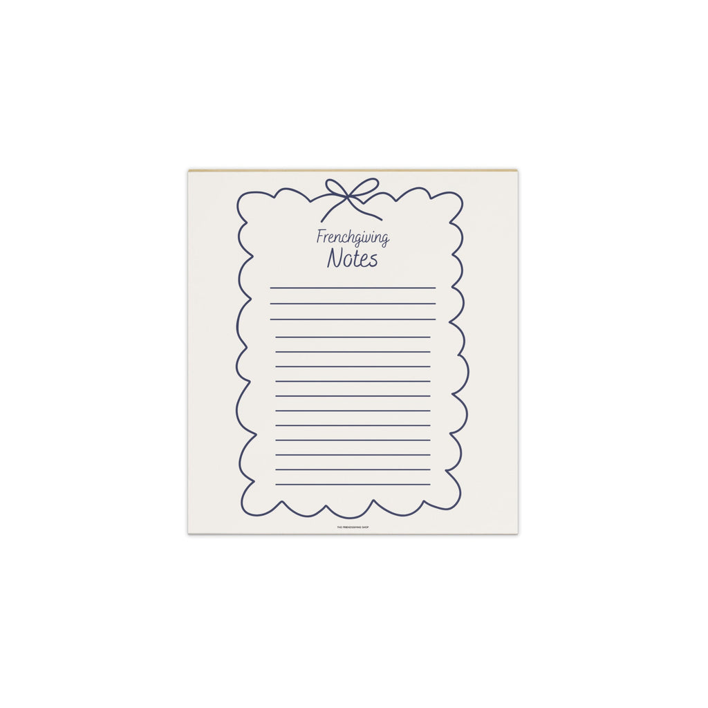 A single sheet of kraft paper shipping notes with a navy blue scalloped border, vertical lines, and the words 'Frenchgiving Notes' printed on it, shown against a plain white background.