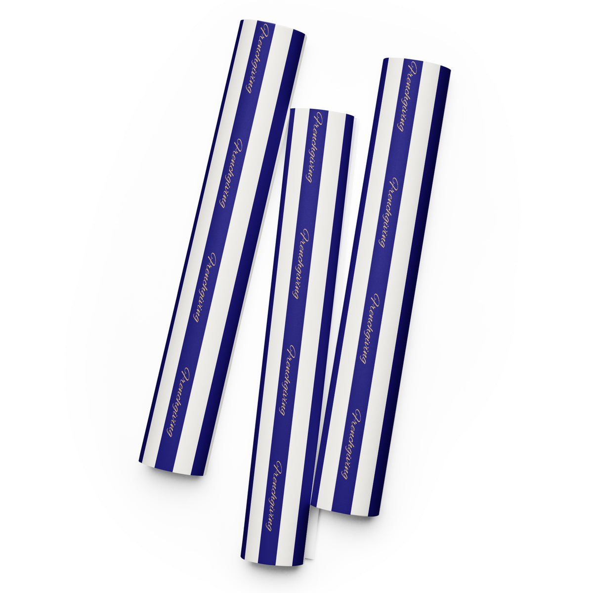 Three rolled sheets of wrapping paper with vertical navy blue and white stripes, featuring the brand name 'Frenchgiving' printed in gold script along the center stripe, set against a plain white background.