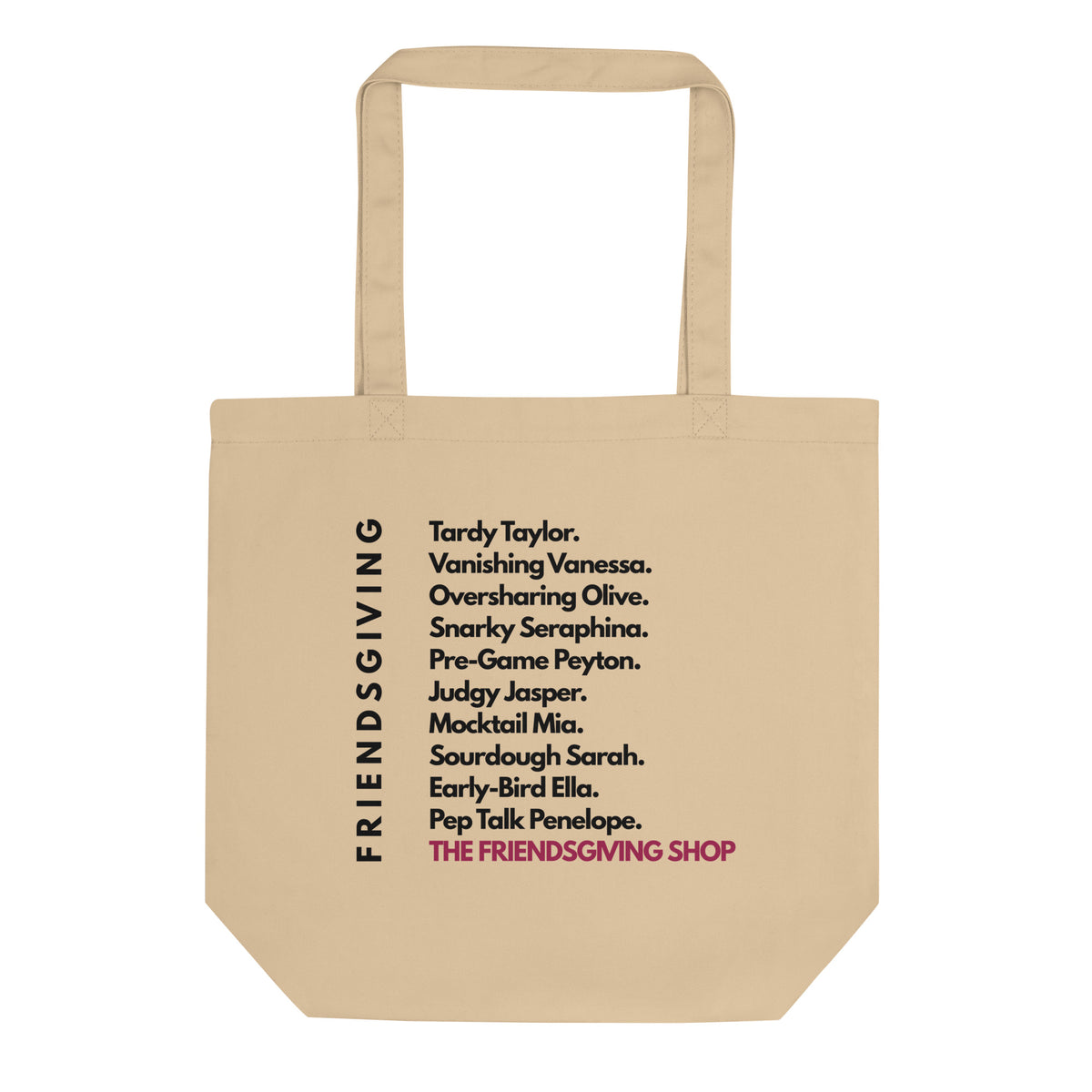 A beige canvas tote bag with printed black text listing friendship tropes and the phrase 'THE FRIENDSGIVING SHOP' in pink, shown on a plain white background.