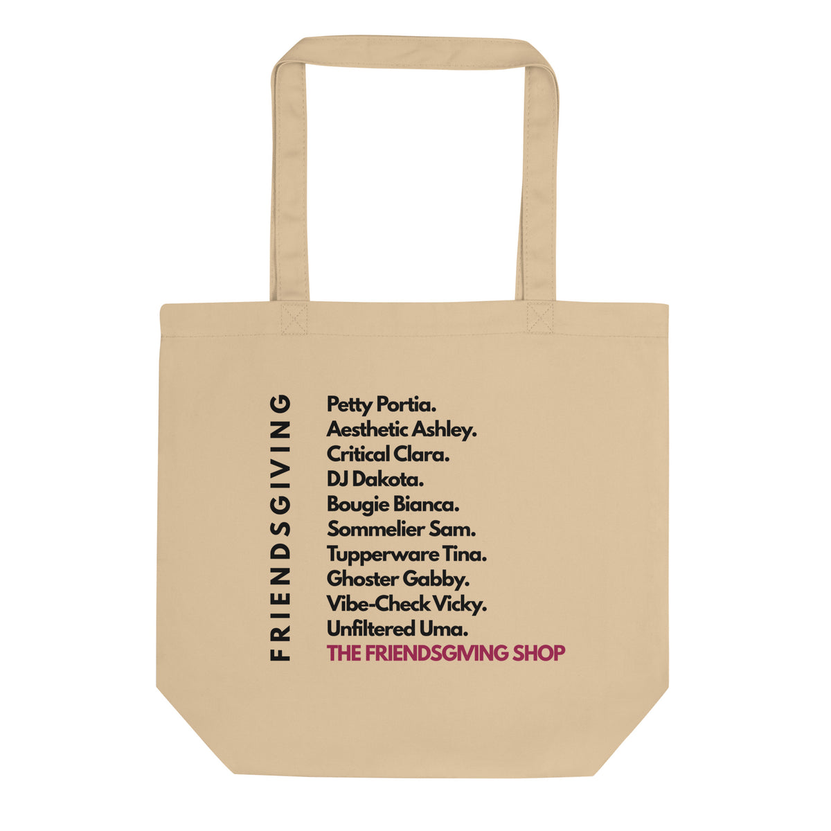 A beige canvas tote bag with black printed text listing friendship tropes and the phrase 'THE FRIENDSGIVING SHOP' in pink, shown on a plain white background.