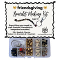 Friendsgiving Bracelet Making Kit by The Friendship Shop, featuring a clear plastic organizer filled with beads, charms, and stones, shown below its white product information card.