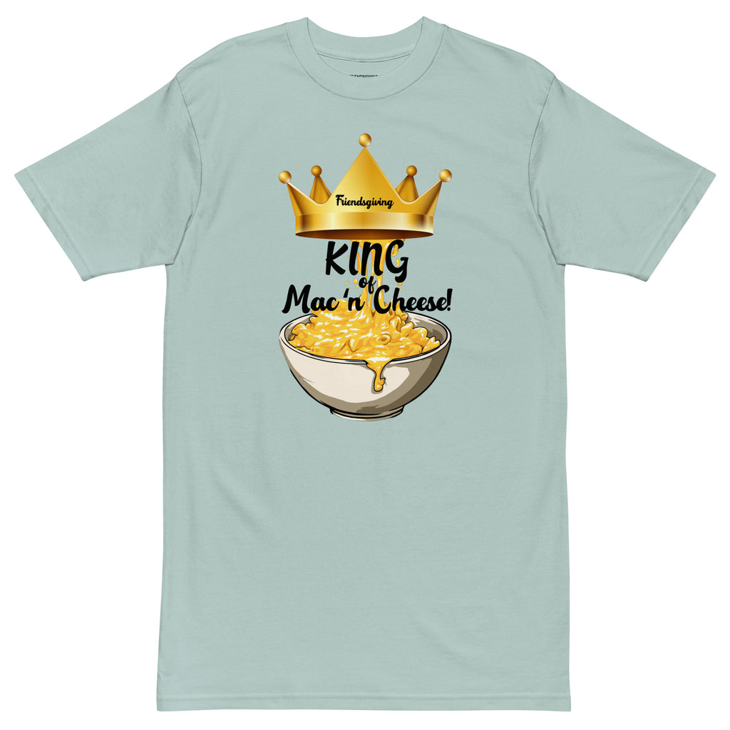 Light blue t-shirt with a graphic of a bowl of mac and cheese and a crown, on a white background.