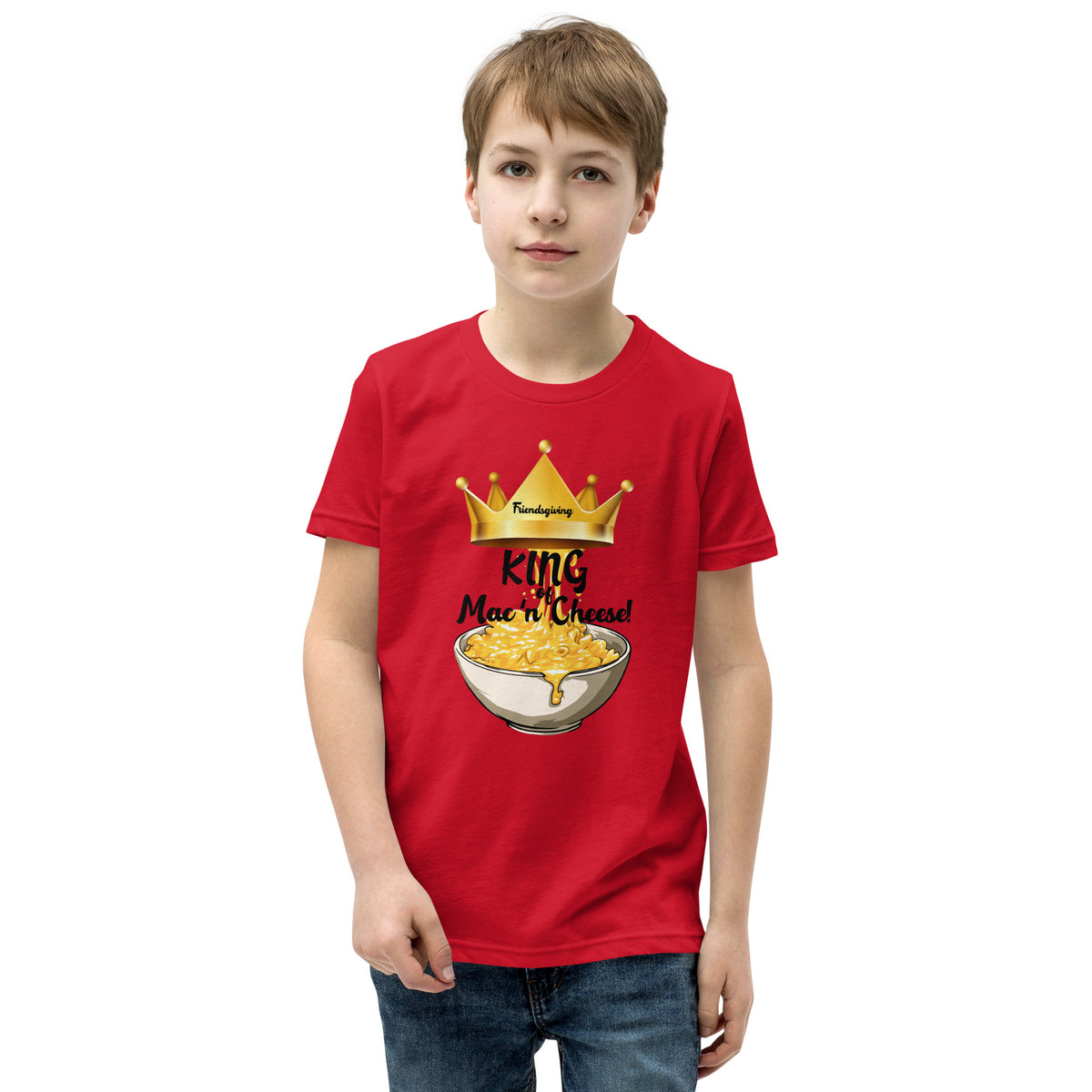 Child wearing a red t-shirt with a graphic design on a white background