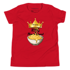 A red short-sleeve t-shirt with a graphic print of a golden crown, the word 'Friendsgiving' in yellow, and the text 'King of Mac n' Cheese!' above an illustration of a bowl of macaroni cheese. The shirt is displayed flat against a solid white background