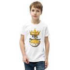 Child wearing a white t-shirt with 'King of Mac n Cheese' design on a white background