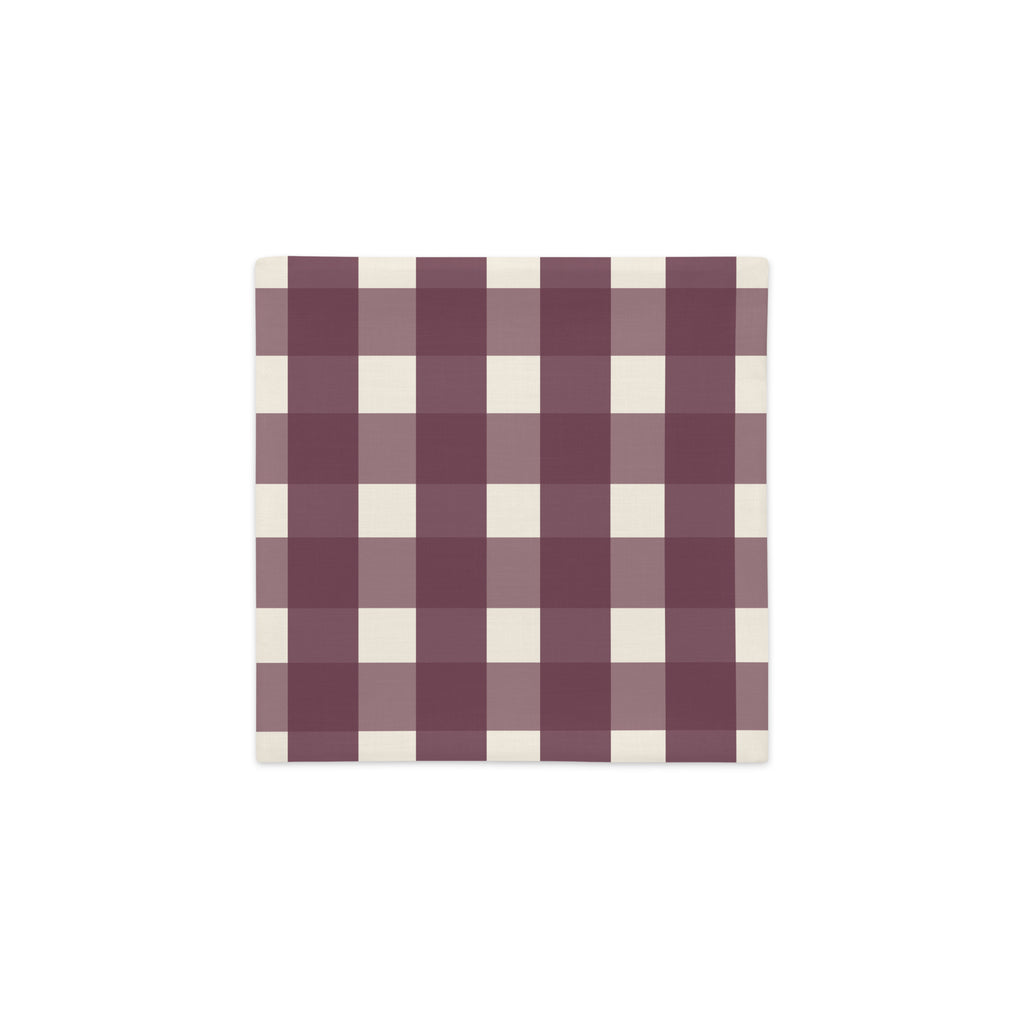 A square checkered coaster with a gingham pattern in dark plum purple and cream, shown on a solid white background.