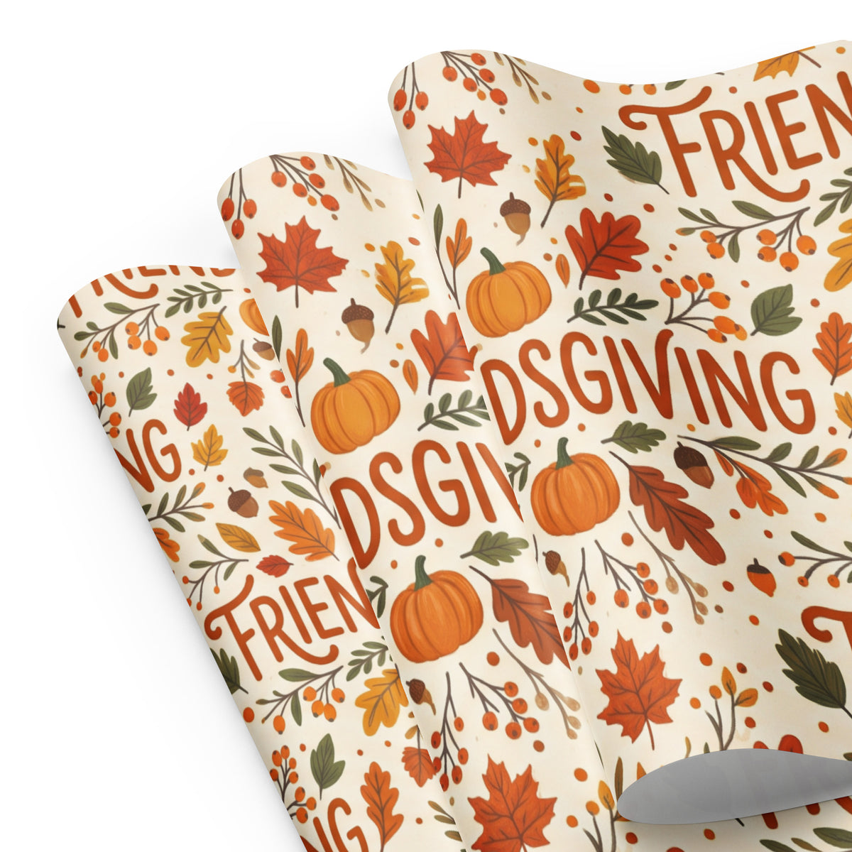 A roll of wrapping paper with a festive autumn pattern featuring pumpkins, leaves, acorns, and berries, printed with the words 'FRIENDLY GIVING' in orange-brown script on a cream background.