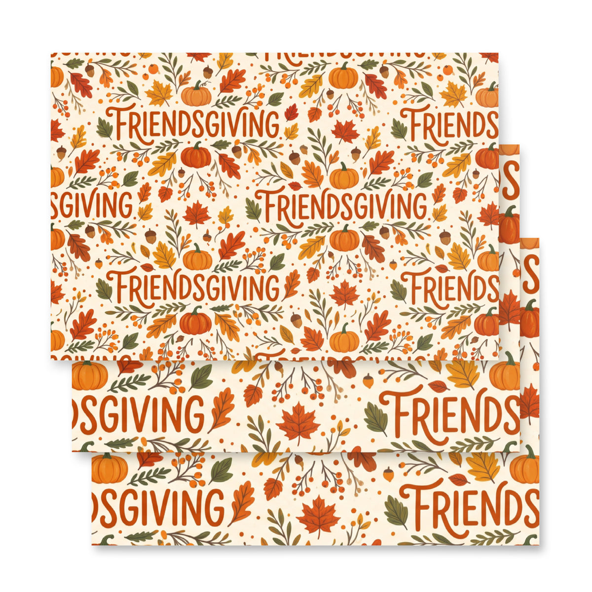 Three stacked square paper napkins with a festive Thanksgiving pattern featuring pumpkins, autumn leaves, acorns, and the word 'FRIENDSGIVING' repeated across an off-white background.