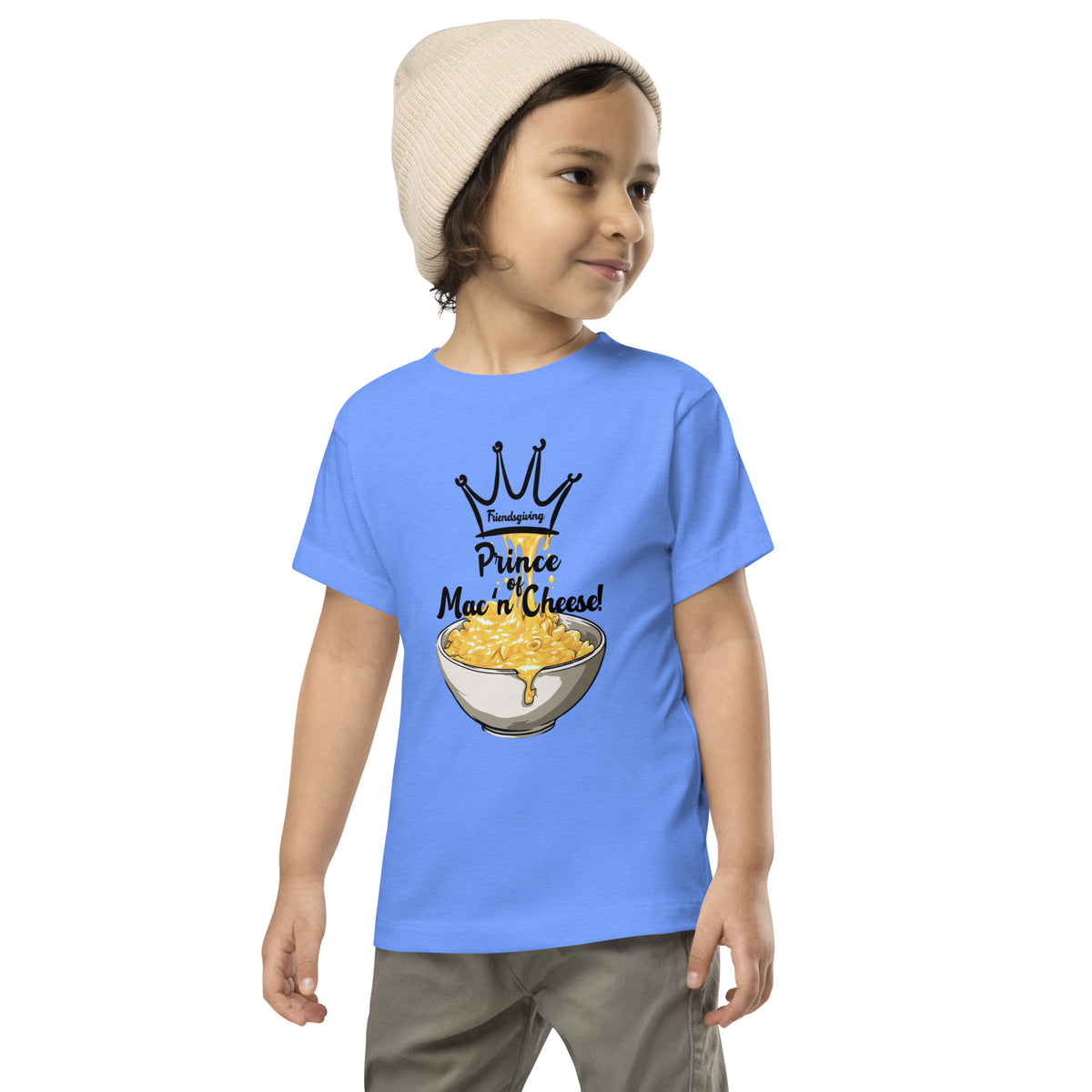 Child wearing a blue t-shirt with a graphic design and text on a white background