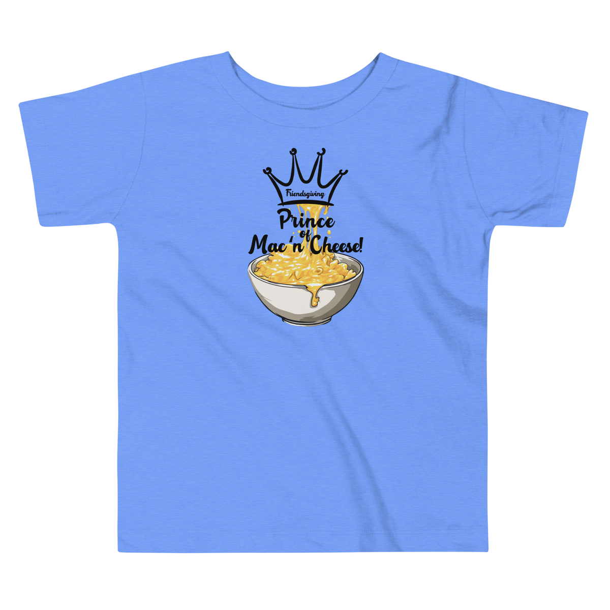 A light blue kids' t-shirt with a graphic print of a crown, the word 'Friendsgiving', and the text 'Prince  of Mac n' Cheese!' above an illustration of a bowl of macaroni and cheese.