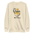 Beige sweatshirt with mac and cheese graphic and text on a white background