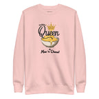 Pink sweatshirt with mac and cheese graphic and text on a white background