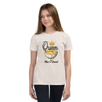 Young girl wearing a heather dust  t-shirt with a colorful mac n cheese design on a white background