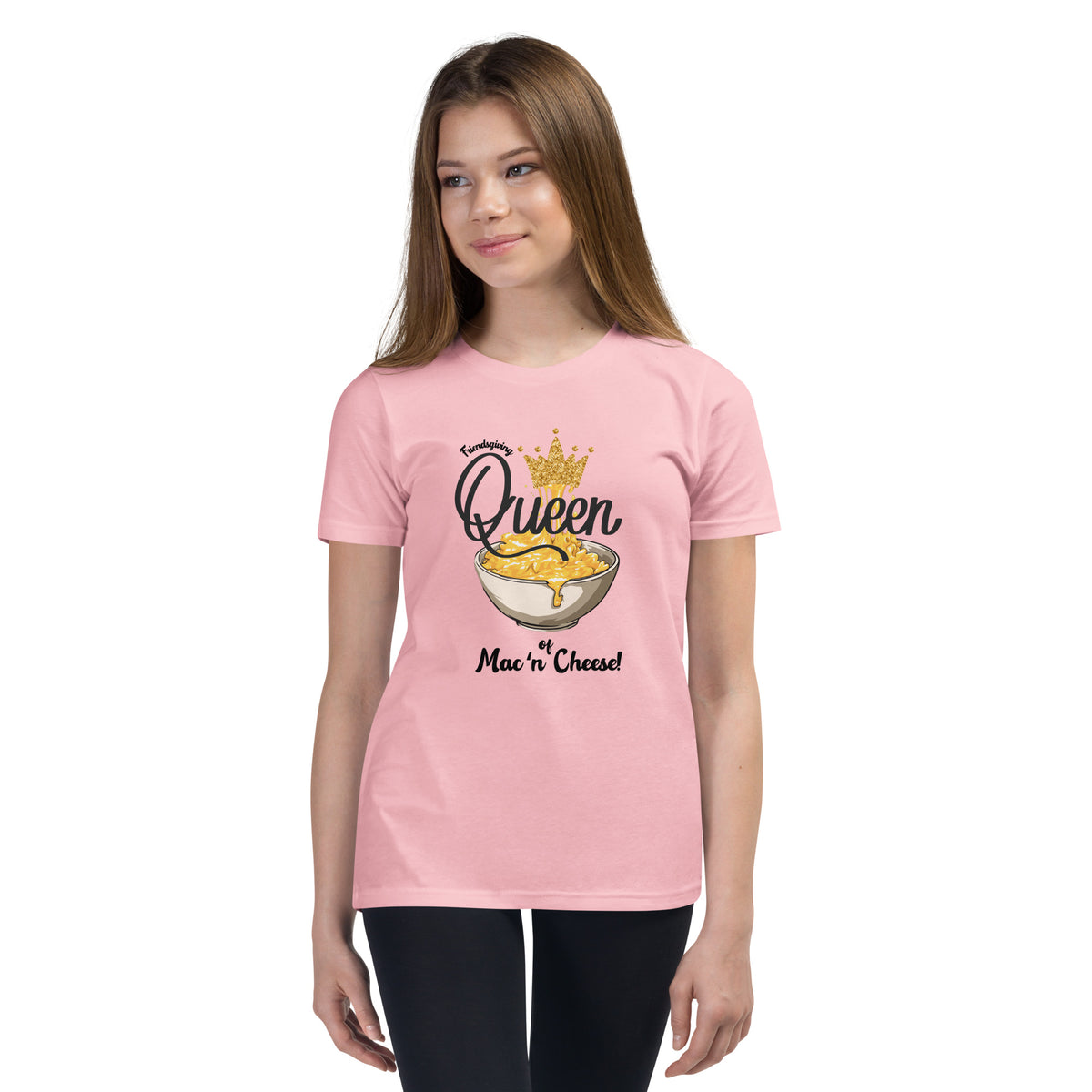 Girl wearing a pink t-shirt with 'Queen of Mac n Cheese' design on a white background