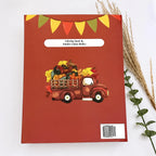 A hardcover book titled 'Another Book By Sandra Colton-Medici' with a red cover, featuring an illustration of a red pickup truck loaded with autumn pumpkins and flowers. The book is displayed flat on a white surface with decorative dried wheat and green leaves on the sides.