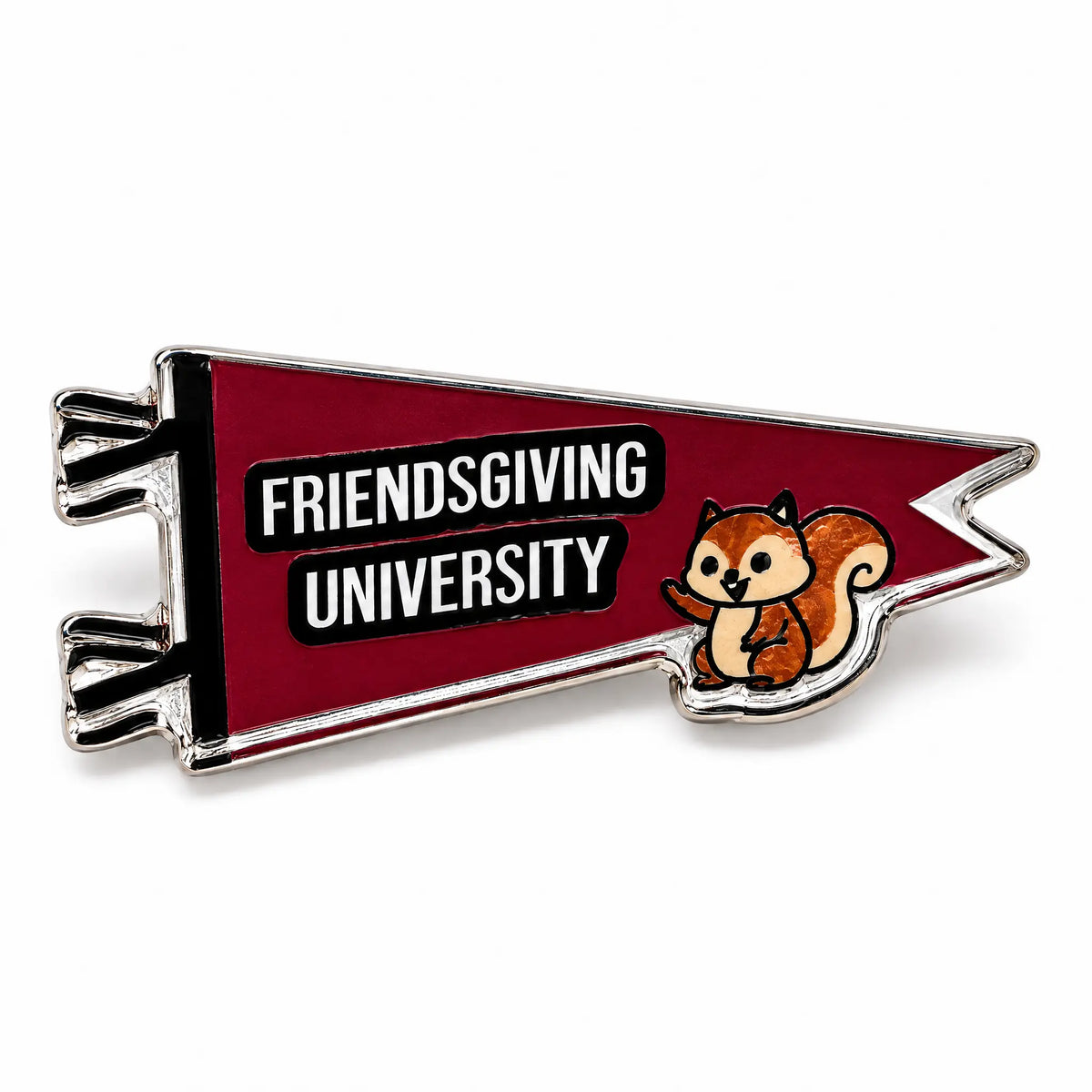 A pennant-shaped enamel pin with a dark red background and silver metal outline. The pin features the text 'FRIENDSGIVING UNIVERSITY' in white letters on black bars, with a small cartoon squirrel on the bottom right.