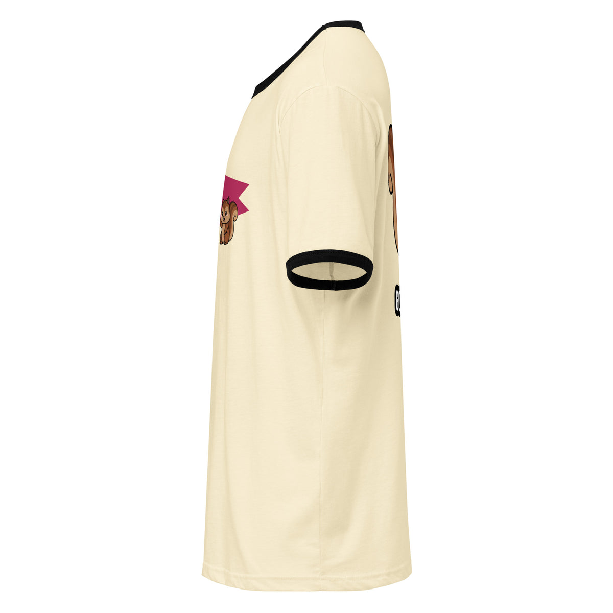 A cream-colored ringer t-shirt shown from a side profile view, featuring black trim on the collar and sleeve cuffs, with cartoon graphic prints on the chest and sleeve.