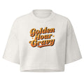 A white cropped t-shirt with a retro-style orange and yellow graphic reading 'Golden Hour Gravy' on the chest, displayed against a solid white background.