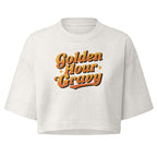 A white cropped t-shirt with a retro-style orange and yellow graphic reading 'Golden Hour Gravy' on the chest, displayed against a solid white background.