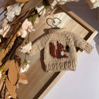 MiniHandKnitSquirrelSweaterOrnaments_WarmOatFront