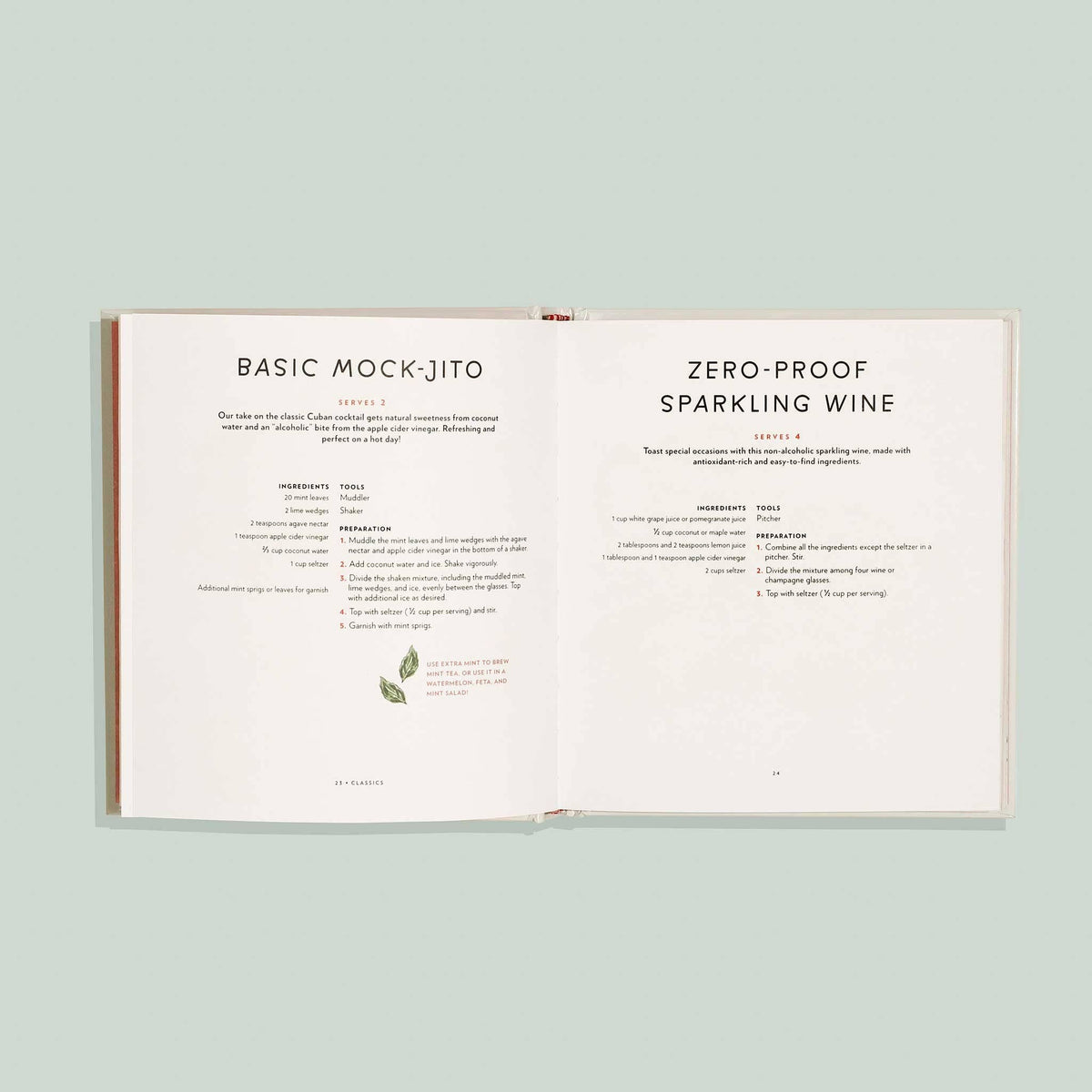 Open book displaying recipes for 'Basic Mock Jito' and 'Zero Proof Sparkling Wine' on a light green background.