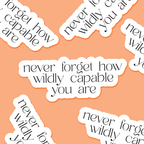 Motivational stickers with text 'never forget how wildly capable you are' on a peach background