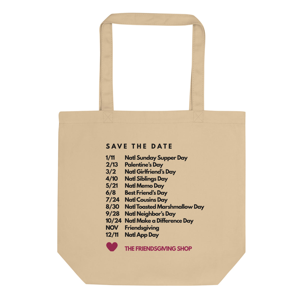 A beige canvas tote bag with black printed text listing 'SAVE THE DATE' dates and a small pink heart logo at the bottom, shown on a plain white background.
