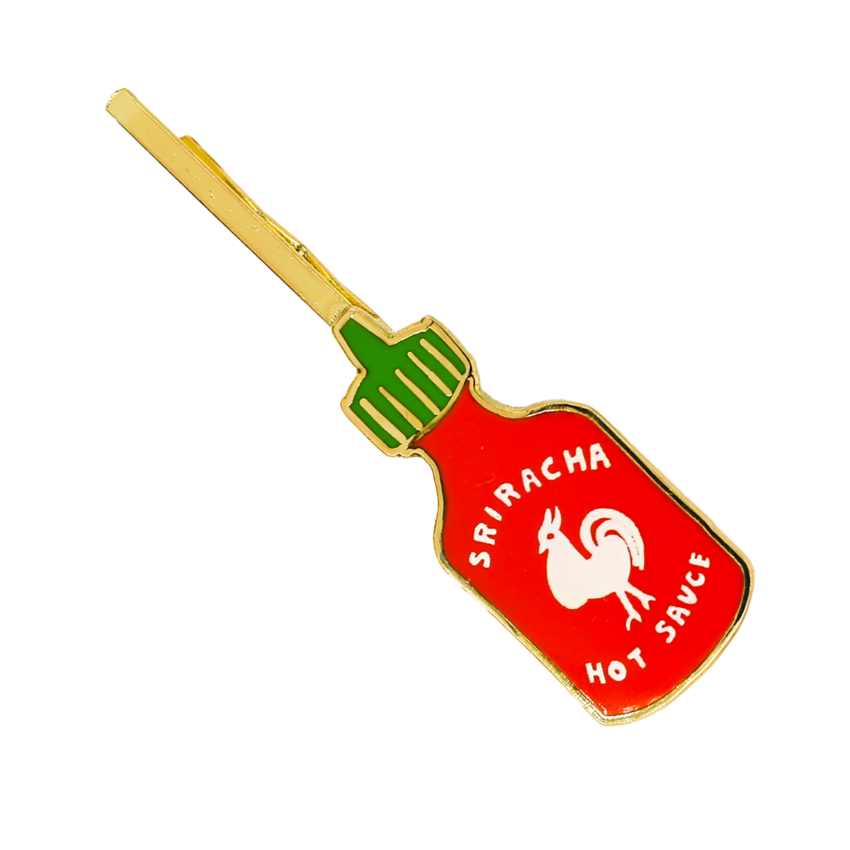 A Sriracha hot sauce bottle-shaped hair clip with red, green, white, and gold enamel details, shown on a plain white background.