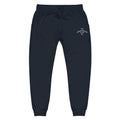 A pair of dark navy sweatpants with a drawstring waist and a small white embroidered logo on the upper right hip, displayed against a solid white background.