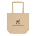 Beige tote bag with 'The Friendsgiving Shop' logo on a white background