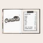 Open book showing a contents page with black text on a white background