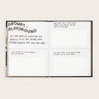 Open book with prompts on a white background