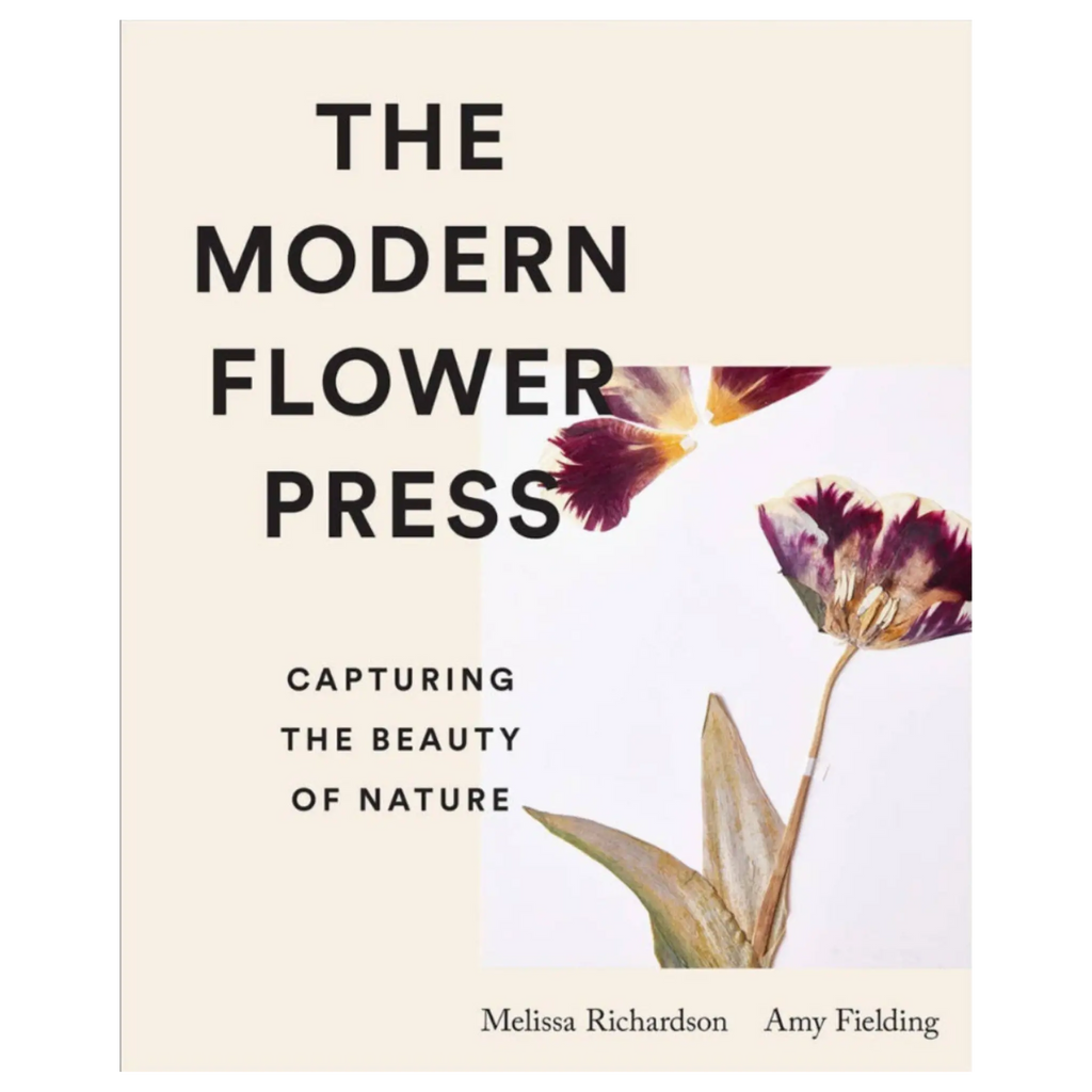Book cover of 'The Modern Flower Press' by Melissa Richardson and Amy Fielding, featuring a cream background with bold black text and a botanical flower illustration.