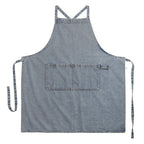 Blue denim apron on a white background