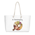 White tote bag with a graphic of a charcuterie board and 'le frenchgiving' text on a white background